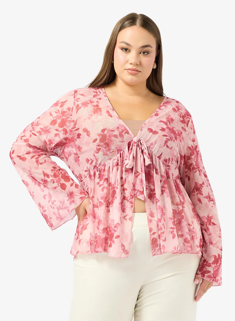 ايلا بلس بلوزة مطبوعة بالزهور مقاس كبير برباط